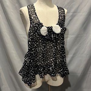 Navy blue and white polkadot sleeveless blouse